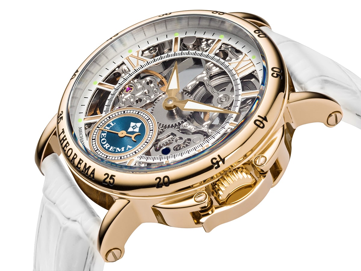 Mechanical watch with skeleton dial with gold case and gold crown and see through silver dial.