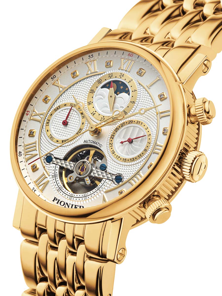 All white dial in a multi-tone design with open-heart at 6 a clock.