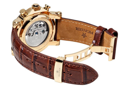 Gold case with brown leather band with deployment buckle and open back case 