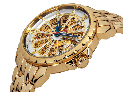 Side view of the London collection with gold plated stainless steel band and a gold case in a skeletonized dial.