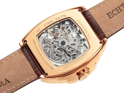 Open back case with rose color mechanism all visible gears and deployment buckle for the band